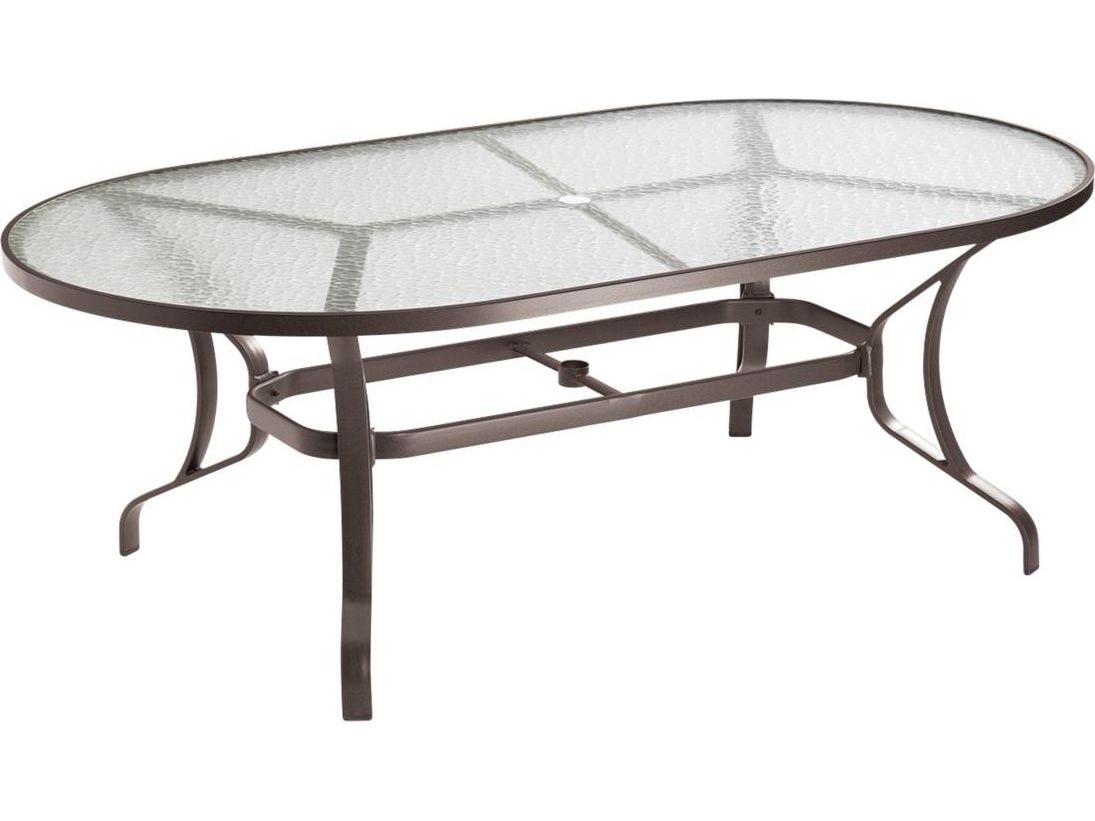 Image of Tropitone Acrylic & Glass Tables Obscure Top Cast Aluminum Oval Umbrella Hole Outdoor Dining Table